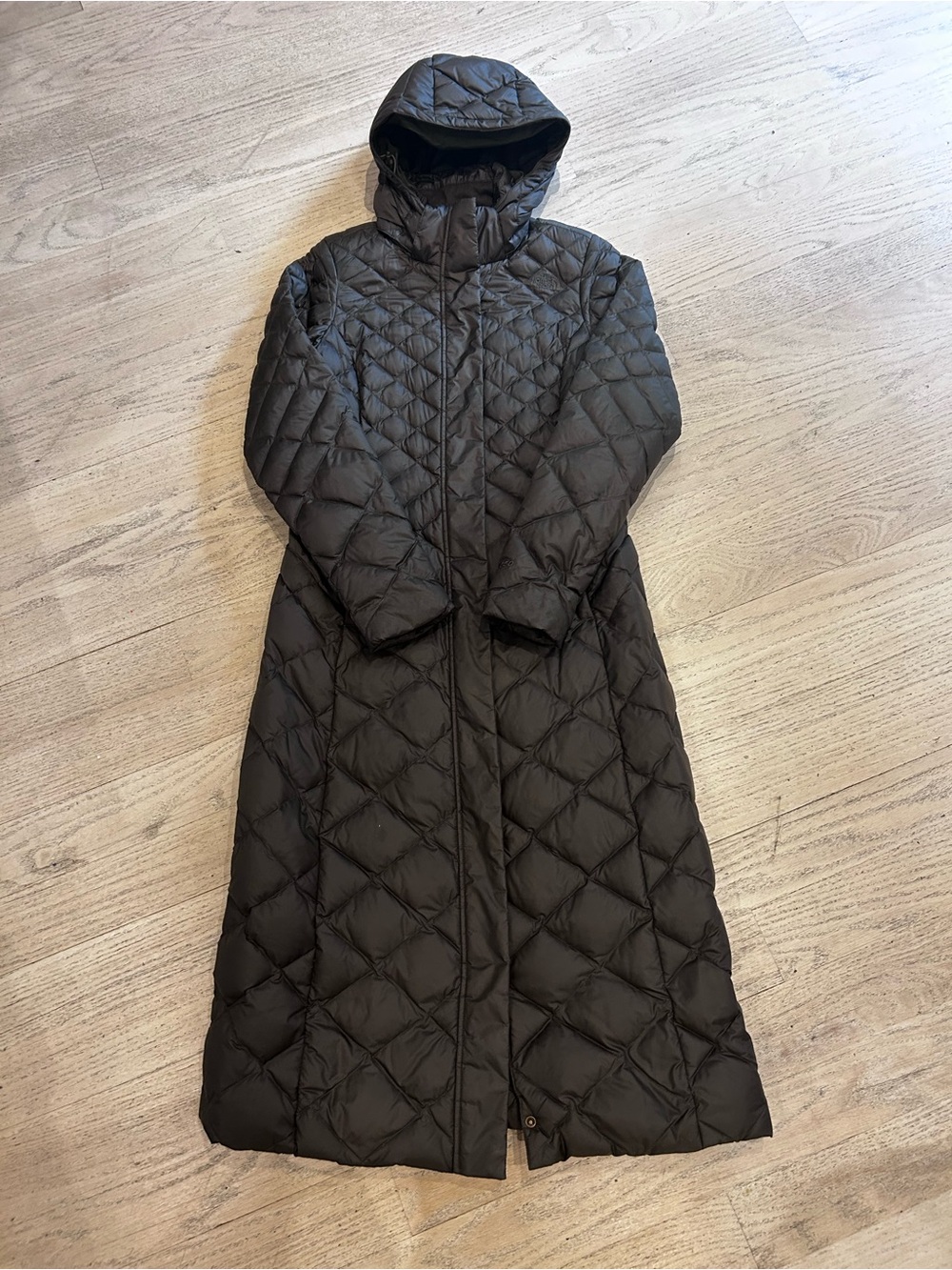 The North Face Women’s Long Quilted Hooded Puffer Coat in Dark Olive Green